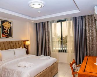 Geneva Hotel - Douala - Schlafzimmer