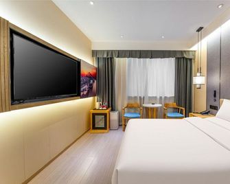 Xingnuo Hotel (Tianjin Xiao Bai Lou Five Avenue) - Tianjin - Makuuhuone