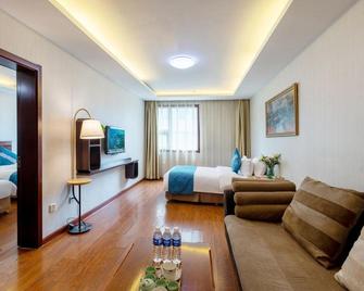 Shenlong Hotel - Xi'an - Schlafzimmer
