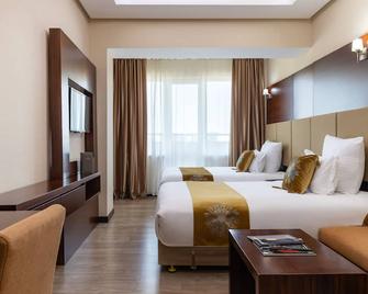 ريجاردال هوتل - ألماتي - غرفة نوم