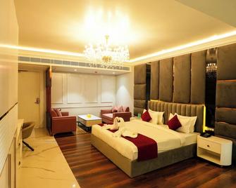 Hotel Adsan Heights - Garhmuktesar - Habitación