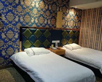 Caiyuan Hotel - Jinhua - Habitación