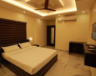 Aman Residency - Thodupuzha - Bedroom