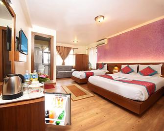 Hotel Amaryllis - קטמאנדו - חדר שינה