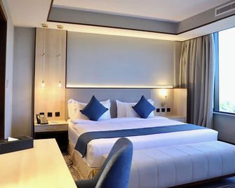 فندق وسبا فايف سيزونز - تبوك - غرفة نوم