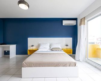 Lumina - DestinationGuyane - Séjours d'affaires sur-mesure - Cayenne - Chambre