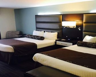 Club Hotel Nashville Inn & Suites - Nashville - Bedroom