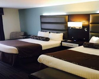Club Hotel Nashville Inn & Suites - נאשוויל - חדר שינה