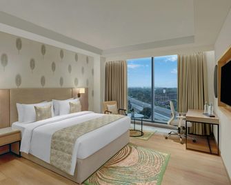 The Fern Residency Gandhinagar, Series by Marriott - Gandhinagar - Schlafzimmer