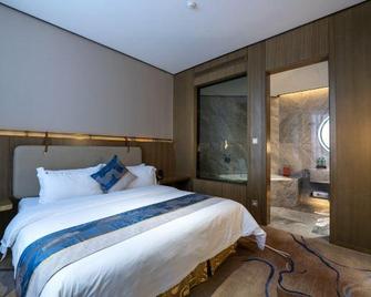 Dongfang Mingyue Business Hotel - Daqing - Schlafzimmer