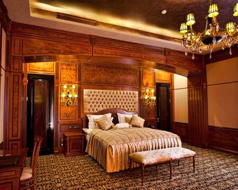 Multi Grand Pharaon Hotel - Arrinj - Bedroom