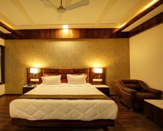 Hotel Keshwaras Residency - Jamnagar - Schlafzimmer