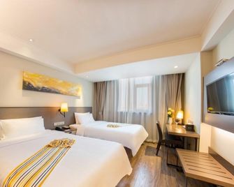 Home Inn Plus Kunming Qingnian Road Golden Eagle Plaza - Kunming - Habitación