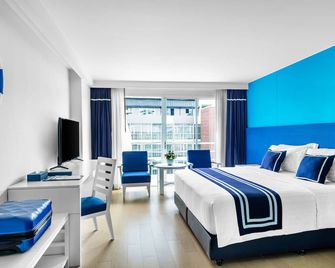 فندق إيه-وان نيو وينغ - باتايا - غرفة نوم