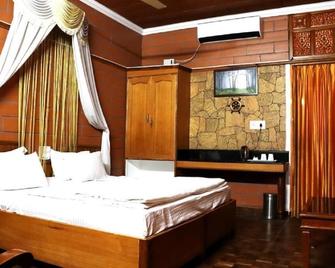 The Nest Inn Resort - Masinigudi - Slaapkamer