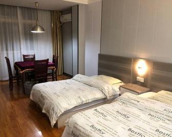 Hotspring Quanshangquan Hotel - Xianning - Slaapkamer