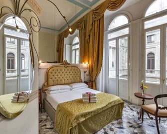 بي آند بي أرتيكلو سويت سانتا بريجيدا - نابليس - غرفة نوم