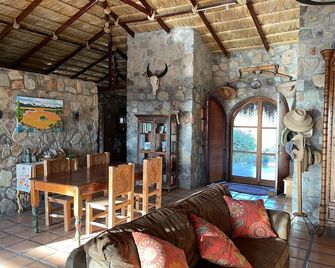 Traditional stone palapa retreat with ocean and desert views - Cabo Pulmo - Dining room
