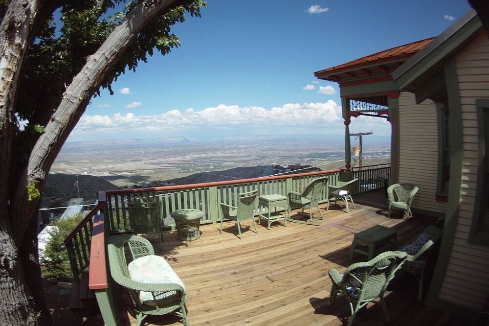 Balcony view of The John Riordan House. Built 1898. Vacant, Buried For 60 Years, Restored 2012