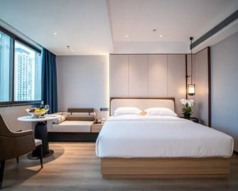 Qingneng Chutian Hotel (Shenzhen Futian Port Convention And Exhibition Center) - שנג'ן - חדר שינה