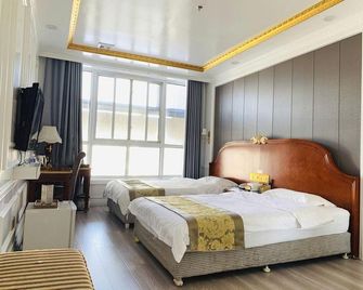 Ningxia Fenghua Haotai Hotel - Shizuishan - Habitación