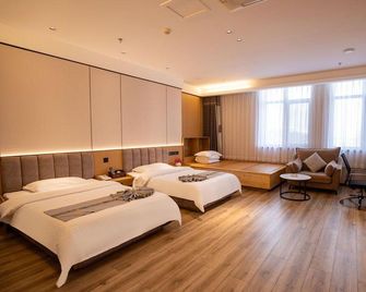 Fuxin Jiujun Hot Spring City Hotel - Fuxin - Habitación