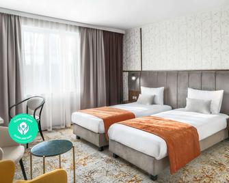 Metropolo by Golden Tulip - קראקוב - חדר שינה