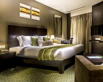 Rodas An Ecotel Hotel - מומבאי - חדר שינה