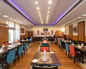 The Competent Palace Hotel - Jhājra - Restaurant