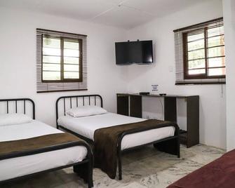 Finca Hotel Los Guayacanes - Risaralda - Habitación