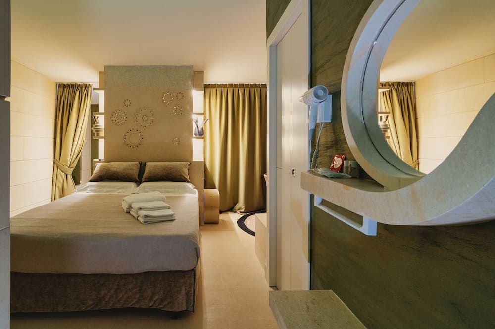 Euphoria Resort - Olgiata - חדר שינה