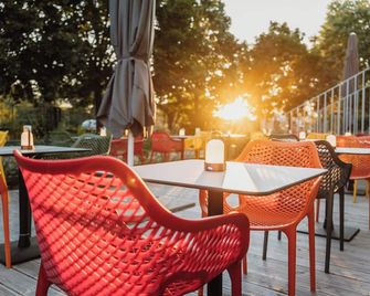 Grimms Hotel Hanau - Hanau - Terasa