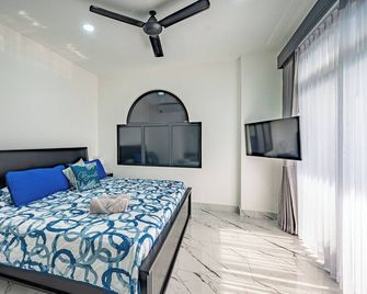Oz Hotel & Sports Bar - Jacó - Schlafzimmer