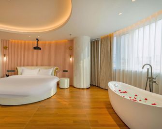 Super 8 Selected Hotel (Jinzhou Bohai University Green Bay Branch) - Jinzhou - Bedroom