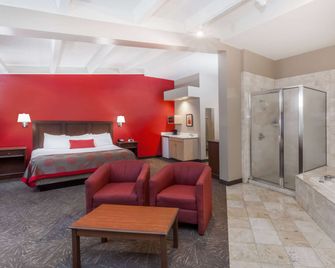 Ramada by Wyndham Hammond Hotel & Conference Center - Hammond - Bedroom