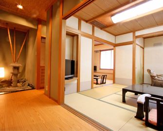 Oga Onsenkyo Oga Hotel - Oga - Slaapkamer