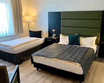 Boutique Hotel Goldene Henne - Wolfsburg - Slaapkamer