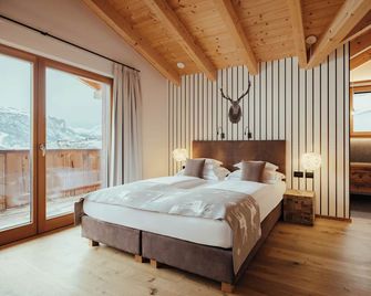 Villa Flora Mountain Lodges - San Cassiano/St. Kassian - Sypialnia