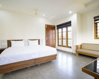 Halo Residency - Ernakulam - Slaapkamer