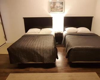 Centennial Motel - Kindersley - Schlafzimmer