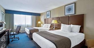 La Quinta Inn & Suites by Wyndham Manchester - Manchester - Makuuhuone