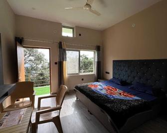 Sunset View Point Homestay - Lansdowne - Sypialnia