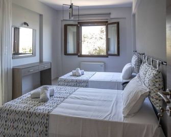 Mela Luxury Apartments - Maroulas - Habitación