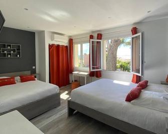 Hotel le Ceinturon - Hyères - Bedroom
