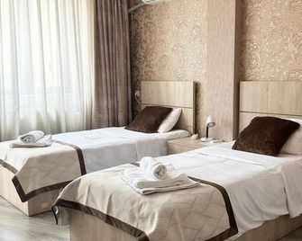 Tbilisi Center Hotel - Tbilisi - Soveværelse