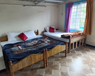 Hrs Budget Stays - Ooty - Schlafzimmer