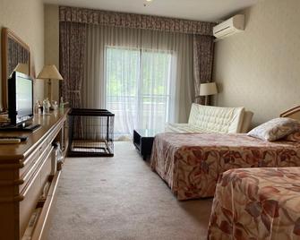 Medallion Belgravia Resort - Neba - Camera da letto