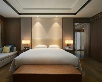 Courtyard by Marriott Xinchang - שאושינג - חדר שינה
