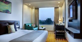 Lemon Tree Hotel Chennai - Chennai - Bedroom