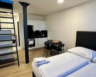 Figaro Suites - Prag - Schlafzimmer